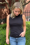 Model is wearing a black cotton muscle tank